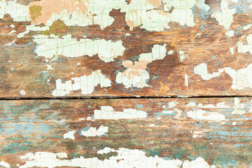 The background of the texture of the surface of the old board covered with paint and weathered for...