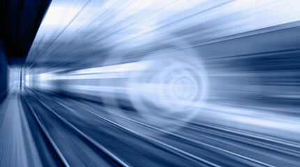 White high speed train runs on rail tracks -Train in motion