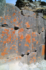 Close up of cyclopean wall with lichen, Ollantaytambo Peru