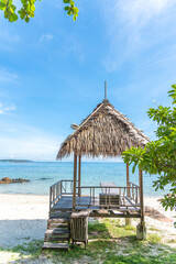Nature in twilight period which including of sunrise over the sea and the nice beach. Summer beach with blue water and purple sky at the sunset.	
