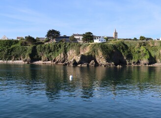 beach and rocks of the village of the island of Houat in Brittany 
