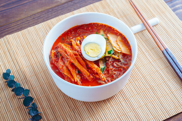 spicy buckwheat noodles with marinated dried pollack, Korean food 'kodari naengmyeon'