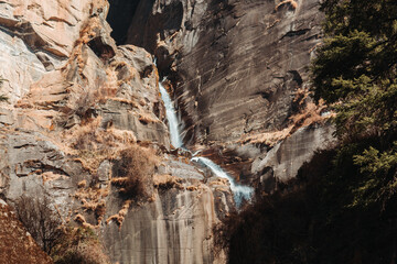 Fototapeta na wymiar View of the Jogini Falls from below the waterfall at Manali, Himachal Pradesh, India