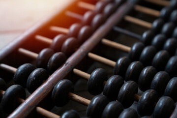 Close up of abacus calculate mathematic vintage object collection on the wooden table, flat lay