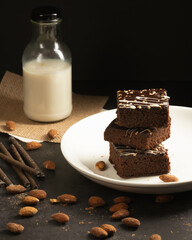 chocolate brownies on dark and white background homemade bakery and dessert white marble top view...