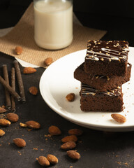 chocolate brownies on dark and white background homemade bakery and dessert white marble top view flat lay looking down with text space copy space