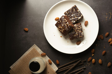 chocolate brownies on dark and white background homemade bakery and dessert white marble top view flat lay looking down with text space copy space