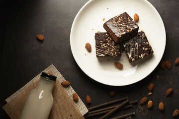 chocolate brownies on dark and white background homemade bakery and dessert white marble top view...