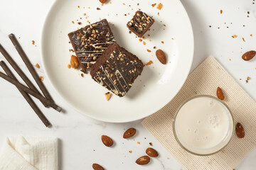 chocolate brownies on dark and white background homemade bakery and dessert white marble top view...