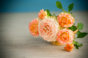 bouquet of beautiful orange roses on table