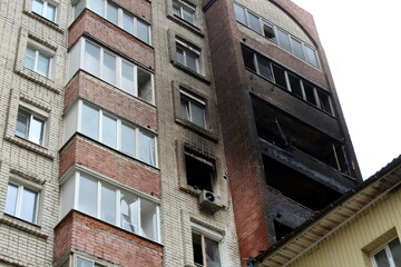 Multi-storey building after a fire. bottom-up view.
