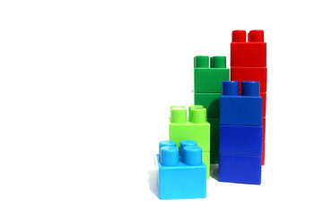 Constructor of different colors built in ascending order on a white isolated background