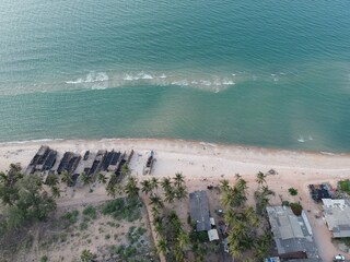 top view beach coconut palm side sea ,drone shot aerial background landscape high season travel 