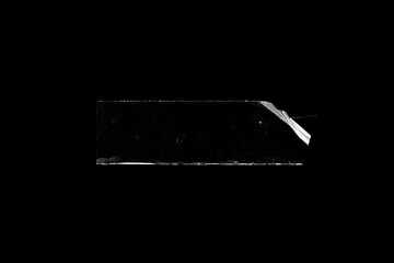 adhesive transparent tape on black background. abstract crumpled sticky tape for poster design...