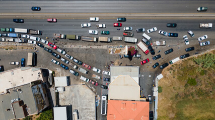 Fototapeta premium Economic crisis: Tens of cars line up near the very few open gas stations in Lebanon