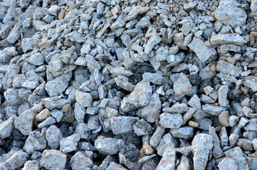 Concrete after crushing for recycling. Reuse crushed concrete rubble, asphalt, building material, blocks and construction waste