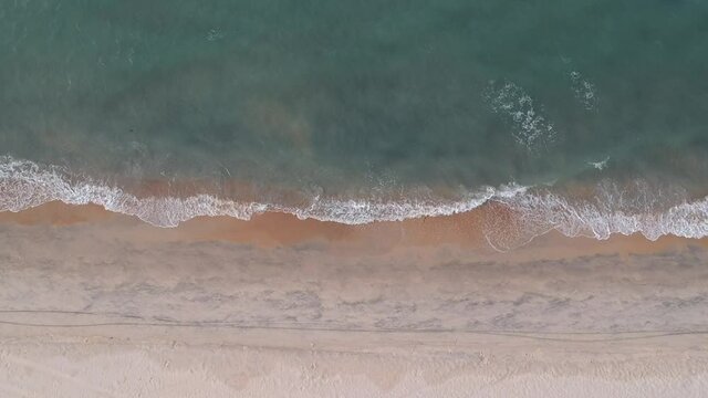 drone shot top view aerial wave sea beach background sand landscape 