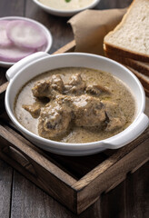 cream chicken curry with bread for lunch