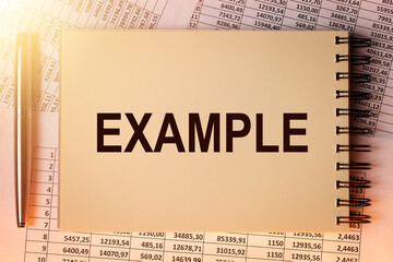 Example word on notebook paper on financial documents.