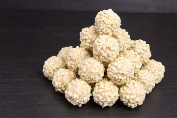 heap of wafer and milk cream balls coated in cookie crumbs