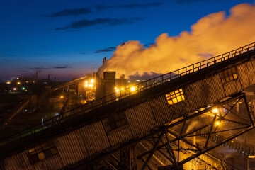 factory worker lights at night