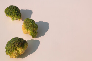 broccoli in assorted positions and white background