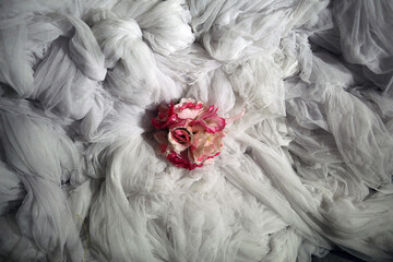 pink roses on white cloth