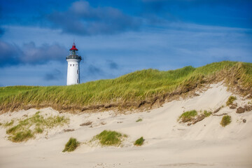 lighthouse Lyngvig Fyr on the coast of denmak - obrazy, fototapety, plakaty