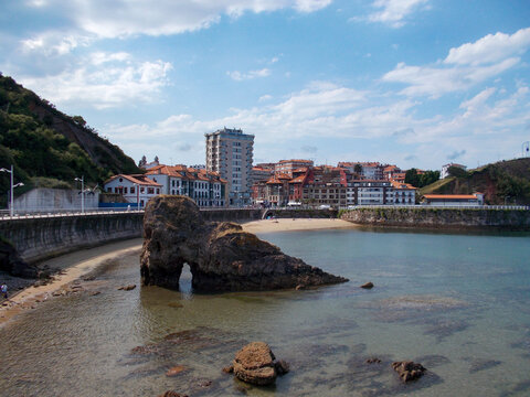 Costa de Candás on a day with blue skies and some clouds in the Principality of Asturias, Spain. Horizontal photography.
