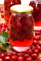 Cherry compote, sour cherries compote, jar of fruit.