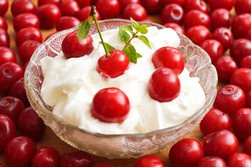 Cherry desert, sour cherries compote, jar of fruit.