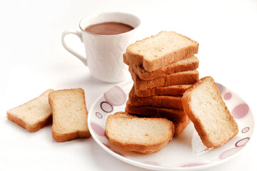 Crunchy Rusk, Cake Rusk or Toast, Traditional biscuit plate with tea, toasts for breakfast.