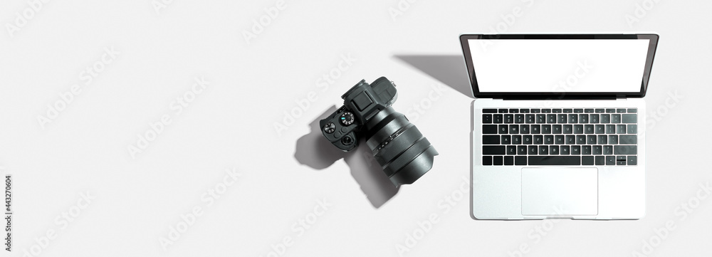 Poster laptop computer with a slr camera