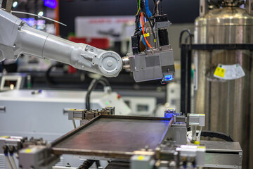 robot arm working in factory