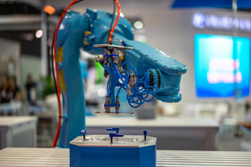 robot arm working in factory