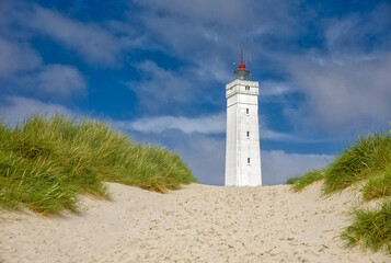 the white square lighthouse of Blavandshuk in denmark - obrazy, fototapety, plakaty
