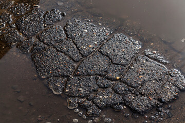 damaged road with damages