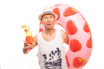 The man poses in a photo studio.