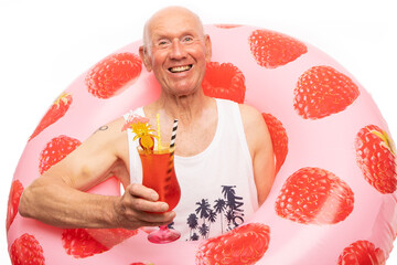 The man poses in a photo studio.