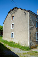 Fototapeta na wymiar Foy house with bullet holes, Band of Brothers, Belgium