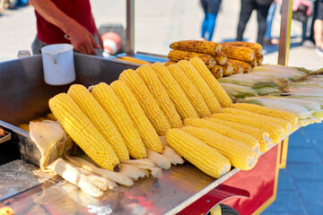 Street counter selling grilled corn in Istanbul. Street food in Turkey