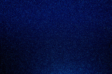Dark blue bokeh glitter texture christmas abstract background