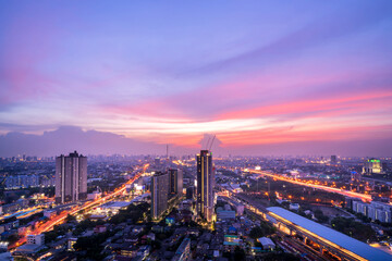Naklejka na ściany i meble Highway top view of night city and sirat expressway at bangkok