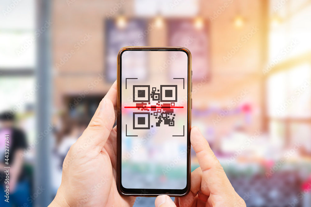 Poster modified inactive qr code used. person scanning qr code with smartphone