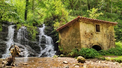 Water mill in PR AS 137 trail between Valbucar and Busllaz villages, also known as 'Molinos del profundu', Villaviciosa, Asturias, Spain
