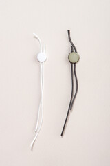 Garment string seal tag.