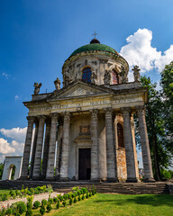Fototapeta na wymiar Beautiful Catholic church in the village of Pidhirtsi, Lviv region.
