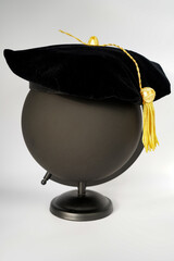 Black PhD doctorate tam cap with gold tassel - obrazy, fototapety, plakaty