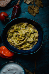 guacamole and sour cream with spicy red hot chilli pepper