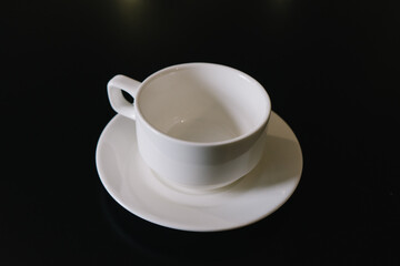 white porcelain cup and saucer for tea or coffee
